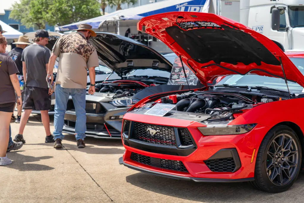 Mustang Week ProCharger booth close up showing mustangs
